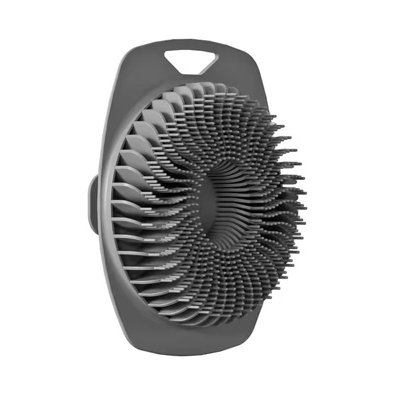 Gray silicone body scrubber shown at an angle with textured bristles and a hanging opening