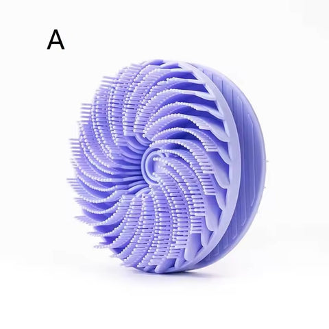 Purple double-sided silicone body scrubber shown at an angle with spiral-patterned bristles