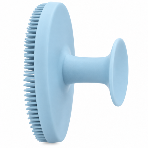Close-up of light blue silicone facial cleansing brush rear finger grip
