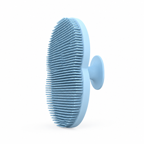 Light blue silicone facial cleansing brush, angled bristle view